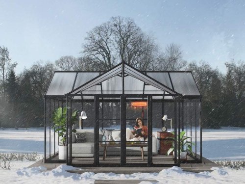 Elegant black T-shaped Lakeside Orangerie greenhouse in a garden setting.