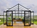 Spacious Lakeside Orangerie interior with high ceilings and plants