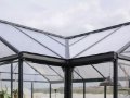 Built-in gutter system efficiently draining rainwater on Lakeside Orangerie greenhouse