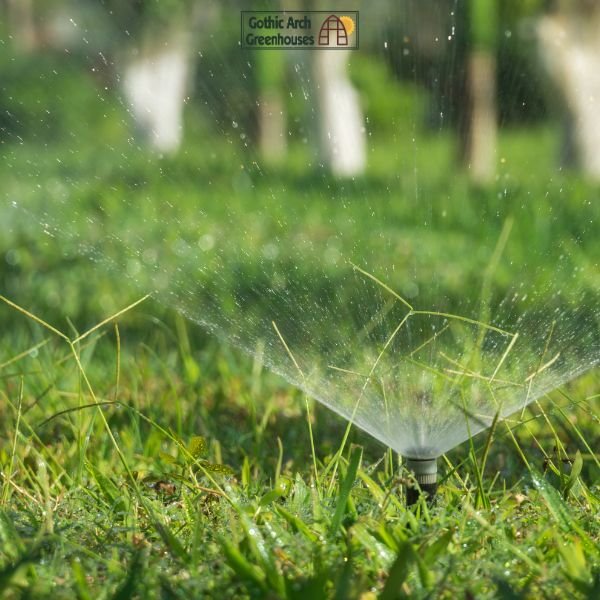 Smart greenhouse water management system showing IoT moisture sensors, digital irrigation control panel, and automated drip lines maintaining optimal hydration for leafy green crops